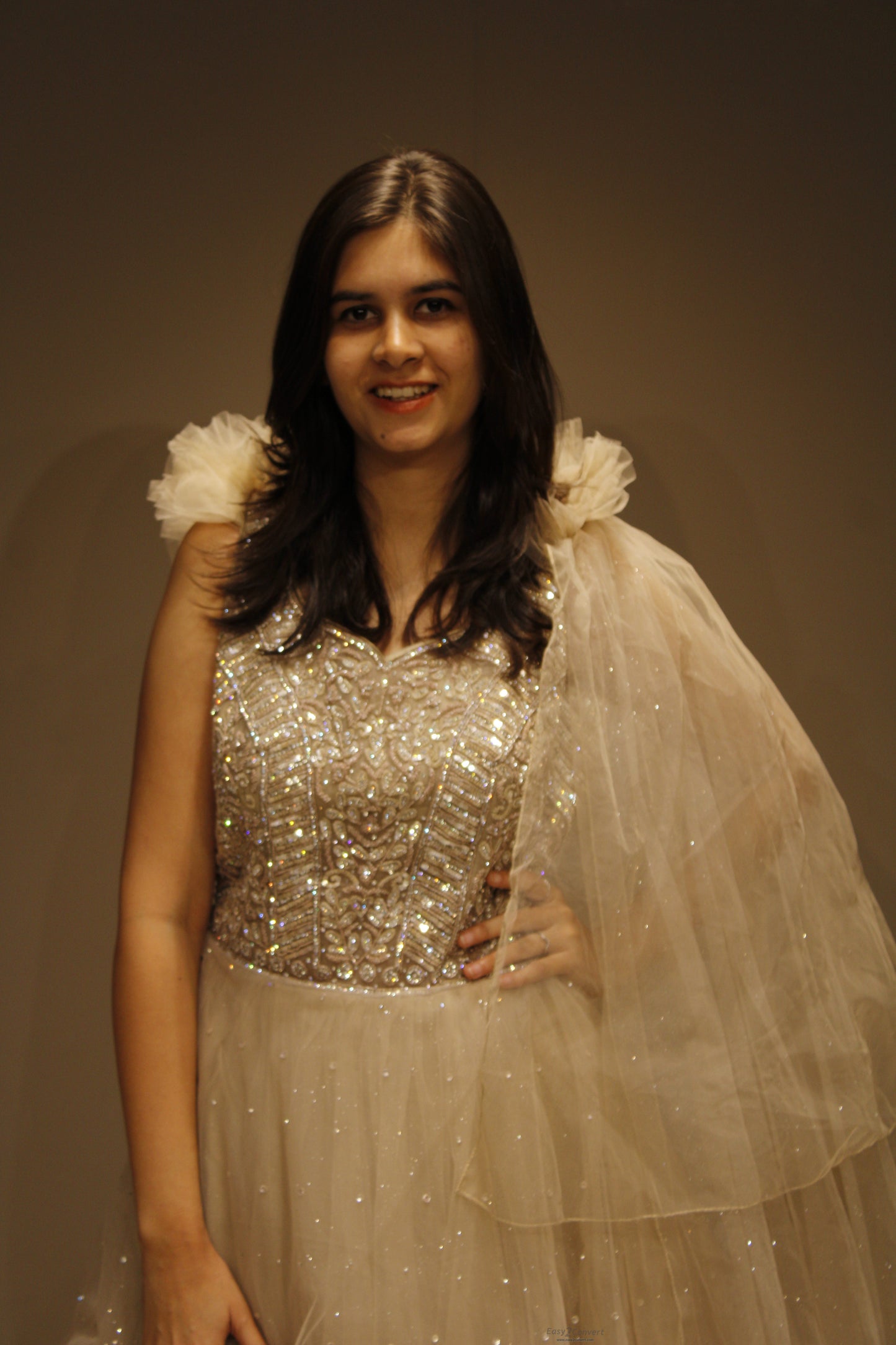 Exquisite Net Gown with Handcrafted Cutdana Embellishments