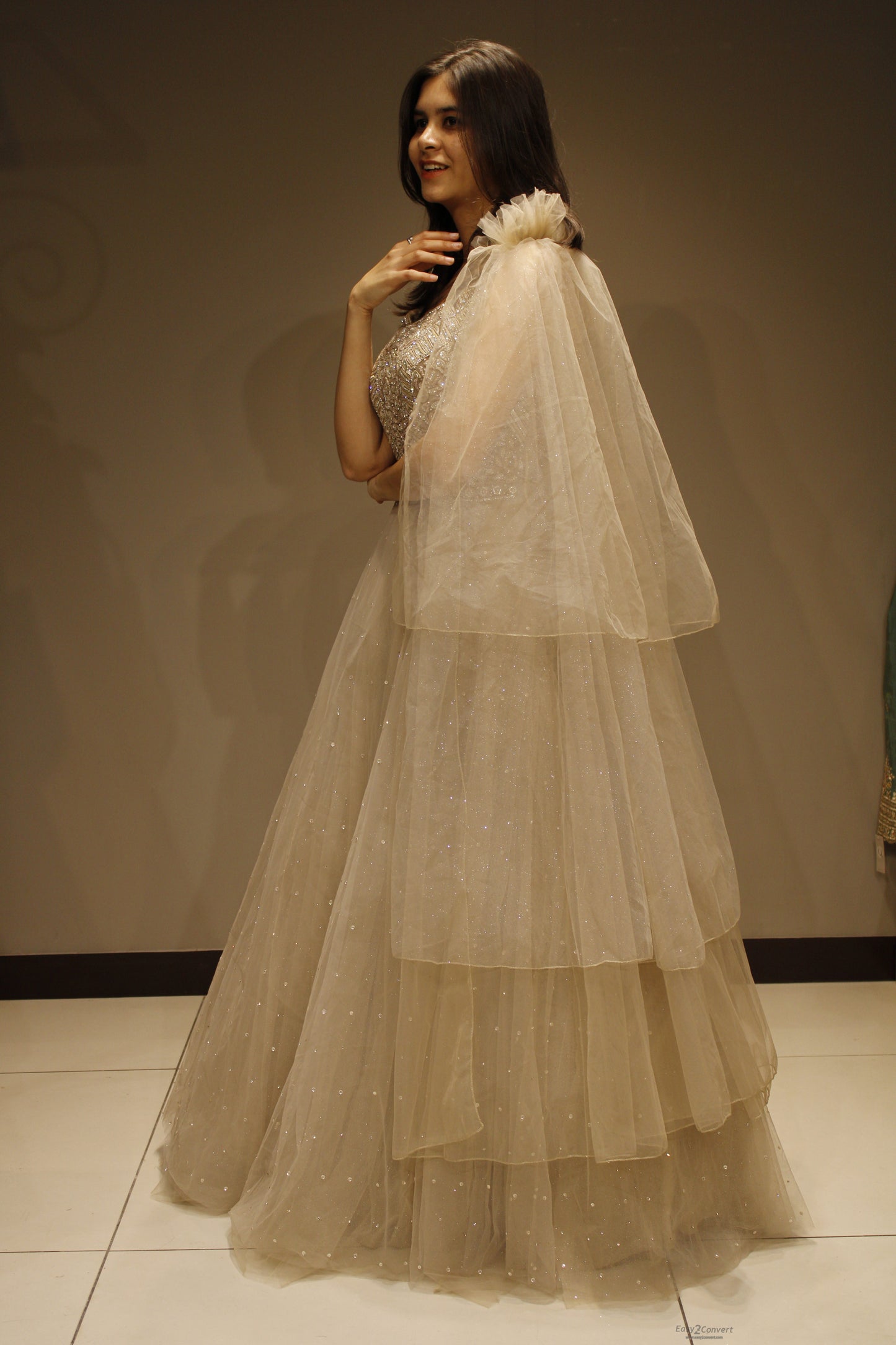 Exquisite Net Gown with Handcrafted Cutdana Embellishments