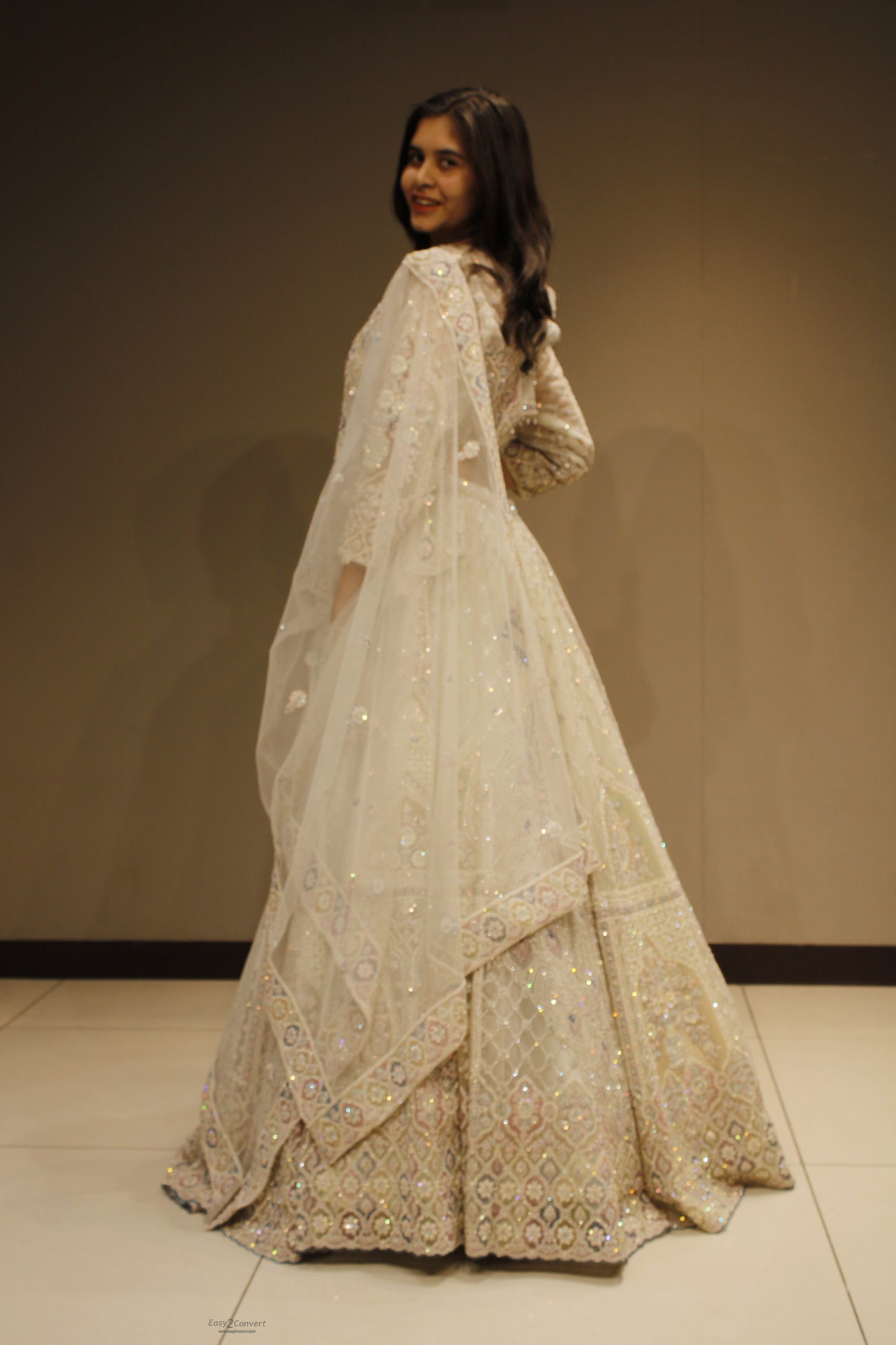 Regal Net Lehenga with Exquisite Zari Embroidery
