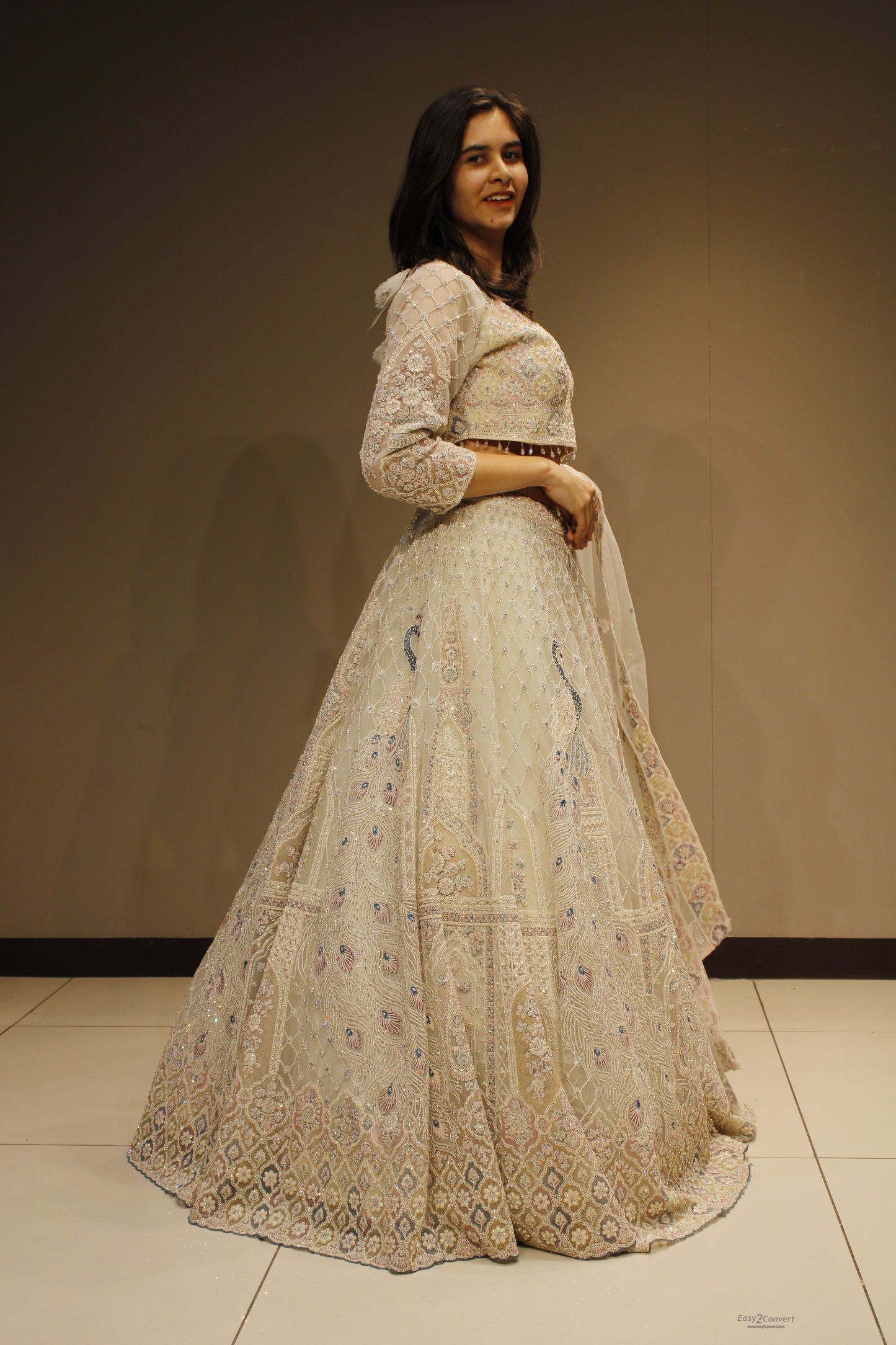 Regal Net Lehenga with Exquisite Zari Embroidery