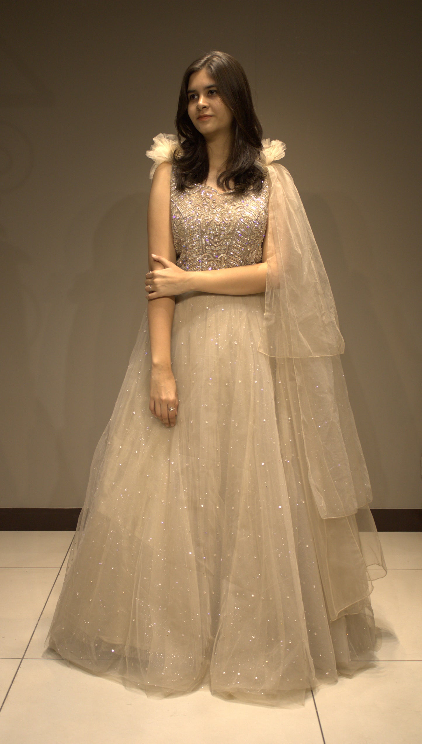 Exquisite Net Gown with Handcrafted Cutdana Embellishments
