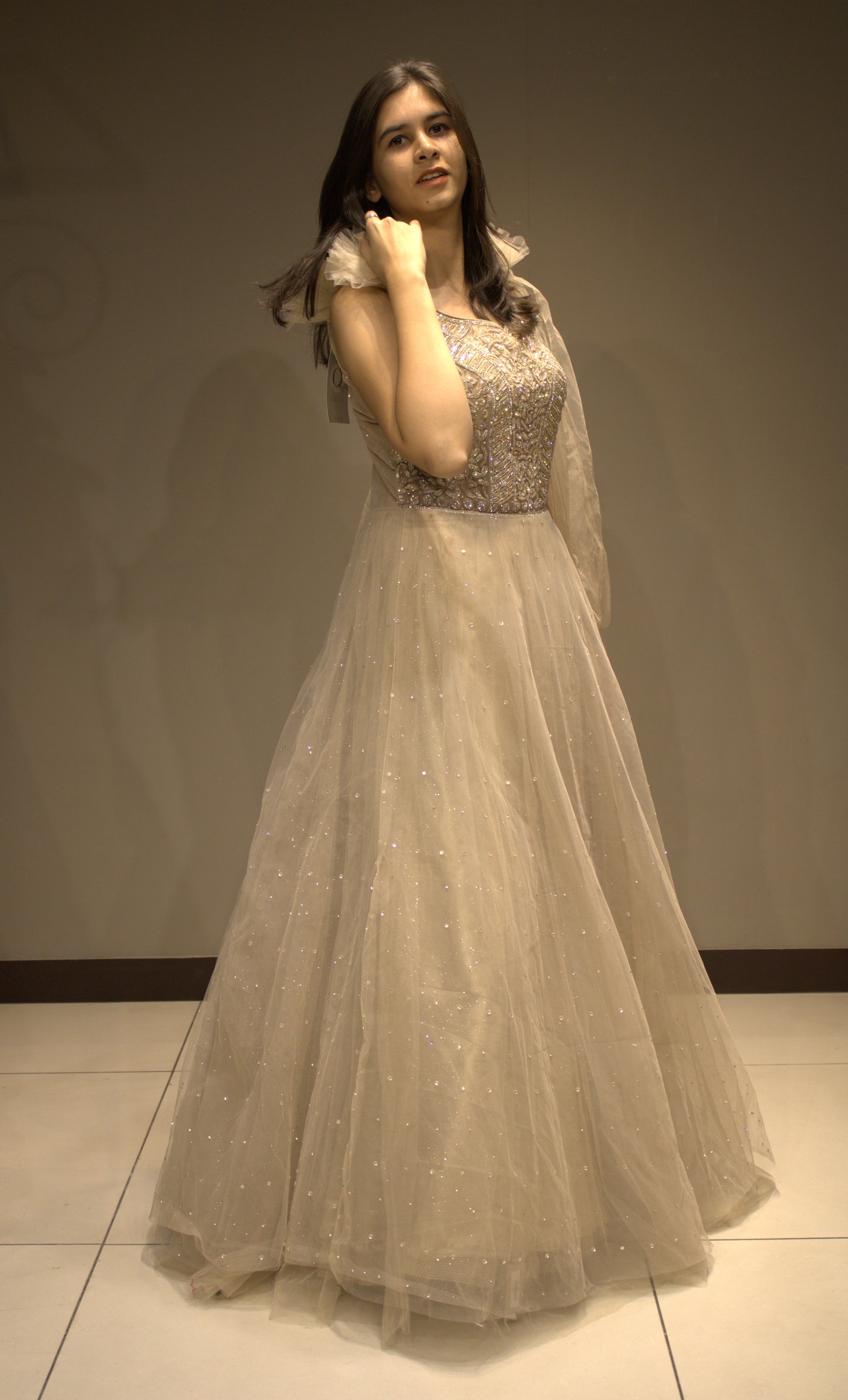 Exquisite Net Gown with Handcrafted Cutdana Embellishments